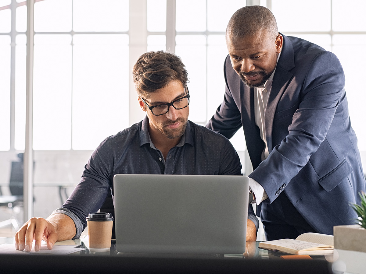 Leadership working with his employee